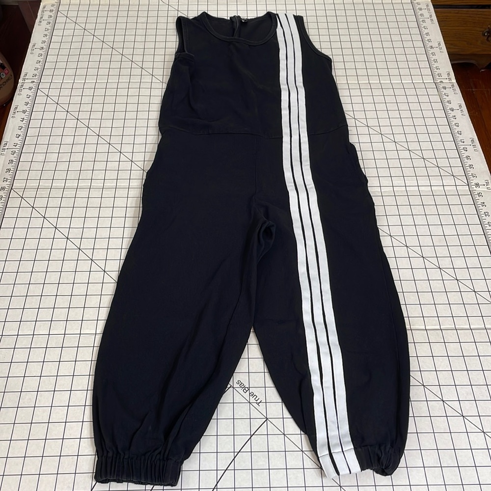 F. Modern black knit cargo-capri sleeveless jumpsuit with white racing stripe